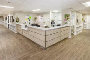 The nurse's station in the hallway at the Country Hills facility