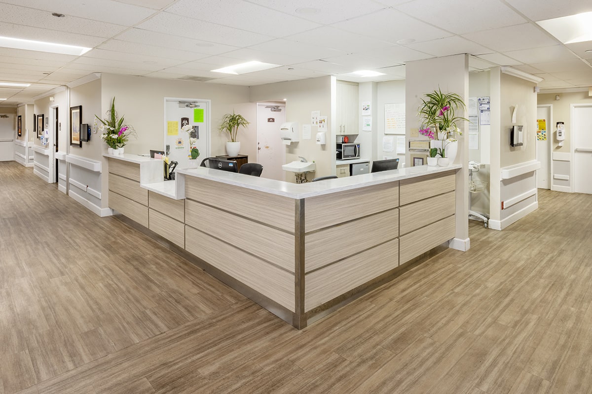 The nurse's station in the hallway at the Country Hills facility