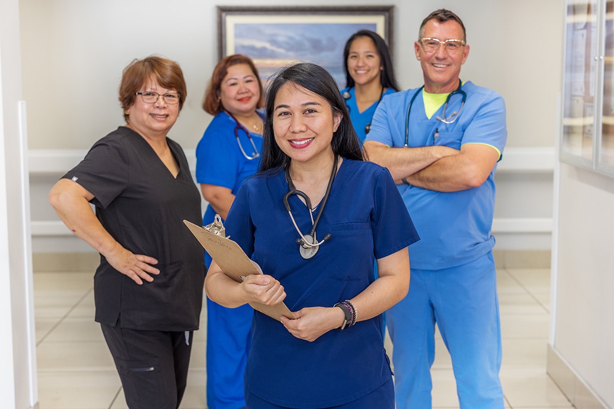 Country Hills facility caregivers in the hallway