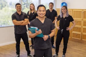 Country Hills facility rehab therapists in the rehab gym