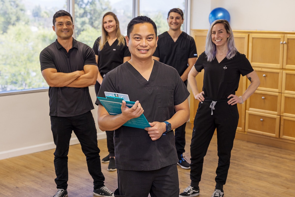 Country Hills facility rehab therapists in the rehab gym