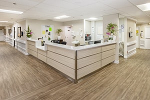 The nurse's station in the hallway at the Country Hills facility